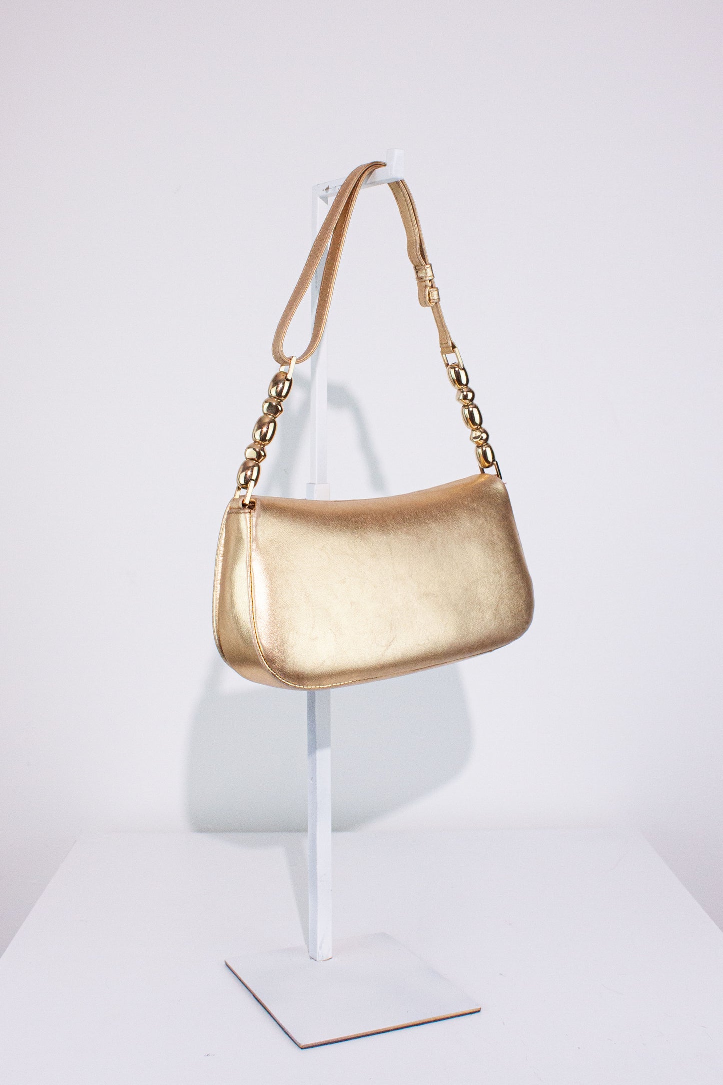 Gold Ostrich Malice Shoulder Bag